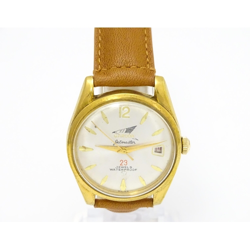 936 - A Garuda Jetmaster gentlemens automatic wristwatch, the dial with date aperture and gilt batons and ... 