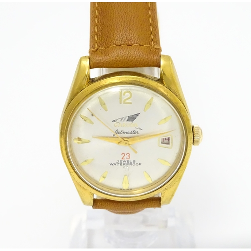 936 - A Garuda Jetmaster gentlemens automatic wristwatch, the dial with date aperture and gilt batons and ... 