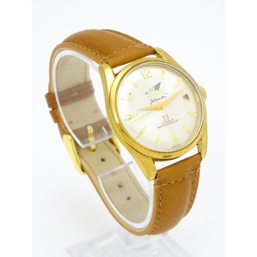 936 - A Garuda Jetmaster gentlemens automatic wristwatch, the dial with date aperture and gilt batons and ... 