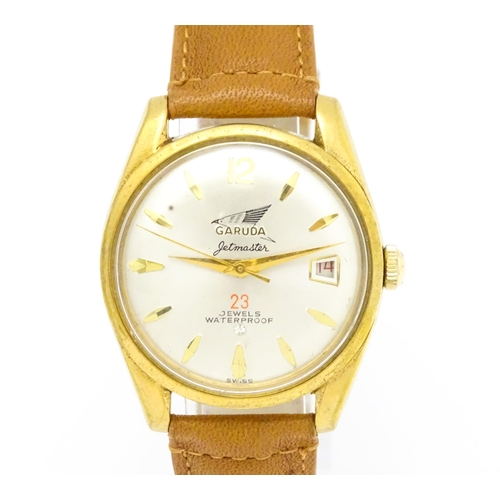 936 - A Garuda Jetmaster gentlemens automatic wristwatch, the dial with date aperture and gilt batons and ... 