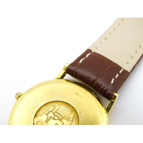 950 - An Omega 18ct gold cased De Ville wristwatch, the dial with hour batons and date aperture. Watch cas... 