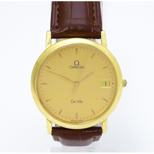 950 - An Omega 18ct gold cased De Ville wristwatch, the dial with hour batons and date aperture. Watch cas... 