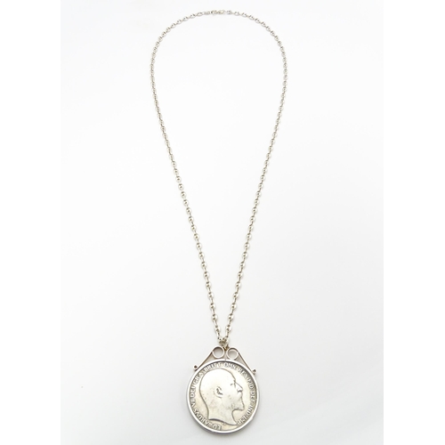 954 - Coin : A 1902 silver crown coin in captive mount on silver chain. Pendant approx. 1 1/2