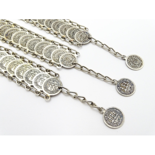 955 - Three bracelets with coin style detail. (3)