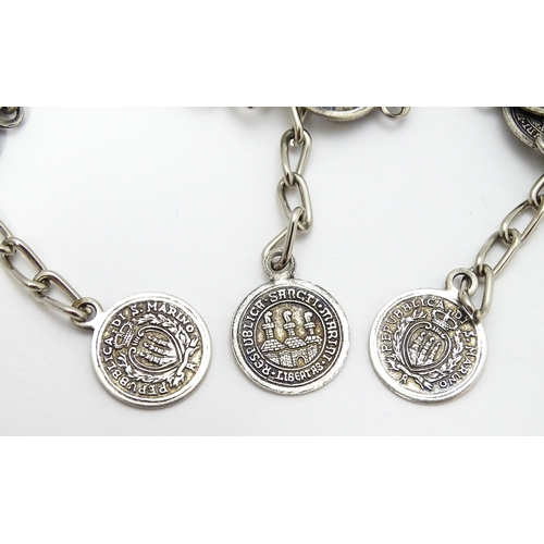 955 - Three bracelets with coin style detail. (3)