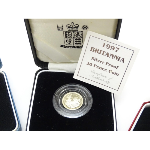 957 - Coins: A quantity of assorted coins to include a Pobjoy Mint commemorative 50p, 1997 Britannia silve... 