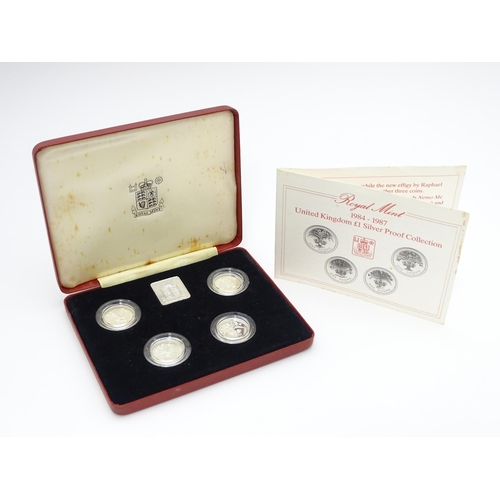 958 - Coins: A Royal Mint 1984-1987 United Kingdom £1 silver proof collection