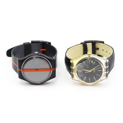 941 - Two Swatch watches with quartz movements, one a numbered edition designed by Felice Varini (2)