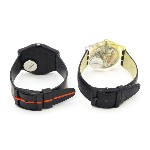 941 - Two Swatch watches with quartz movements, one a numbered edition designed by Felice Varini (2)