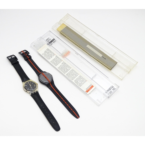 941 - Two Swatch watches with quartz movements, one a numbered edition designed by Felice Varini (2)