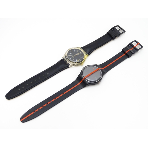 941 - Two Swatch watches with quartz movements, one a numbered edition designed by Felice Varini (2)