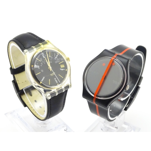 941 - Two Swatch watches with quartz movements, one a numbered edition designed by Felice Varini (2)