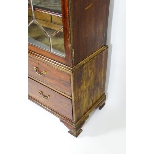 1530 - A George II / George III low waisted bookcase with an impressive swans neck architectural pediment w... 