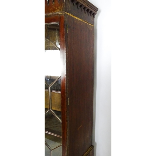 1530 - A George II / George III low waisted bookcase with an impressive swans neck architectural pediment w... 