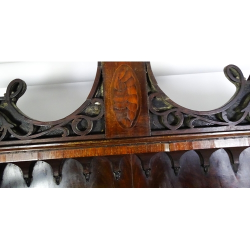 1530 - A George II / George III low waisted bookcase with an impressive swans neck architectural pediment w... 