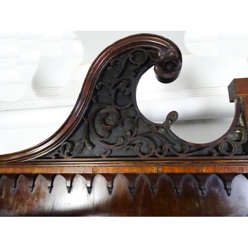 1530 - A George II / George III low waisted bookcase with an impressive swans neck architectural pediment w... 