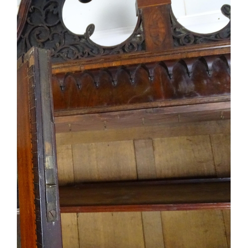 1530 - A George II / George III low waisted bookcase with an impressive swans neck architectural pediment w... 