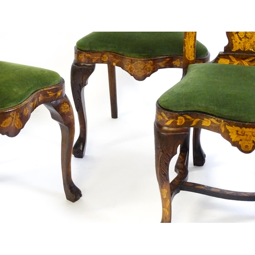 1546 - A group of late 19thC and early 20thC marquetry inlaid side chairs in the George I style, having sat... 