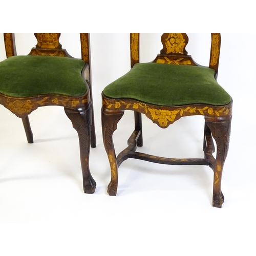 1546 - A group of late 19thC and early 20thC marquetry inlaid side chairs in the George I style, having sat... 