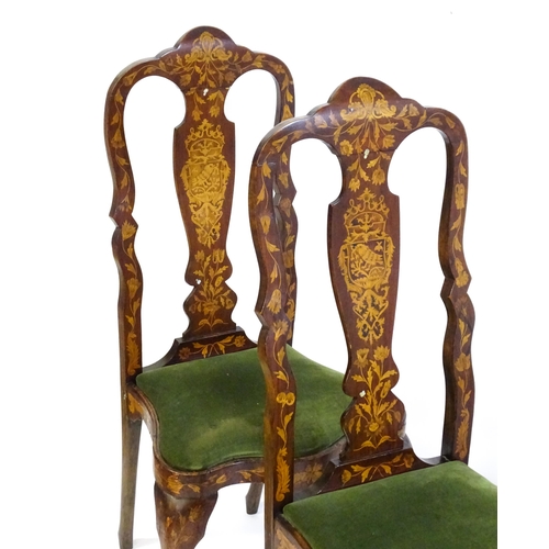 1546 - A group of late 19thC and early 20thC marquetry inlaid side chairs in the George I style, having sat... 