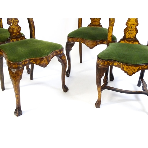 1546 - A group of late 19thC and early 20thC marquetry inlaid side chairs in the George I style, having sat... 