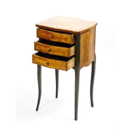 1569 - An early 20thC Kingwood bedside table with three short drawers raised on cabriole legs. 16