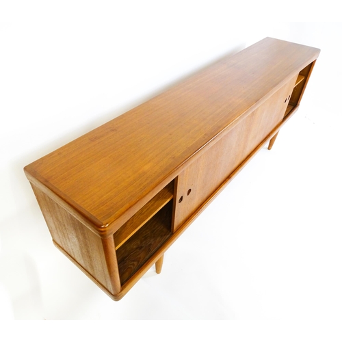 1756 - Vintage / Retro: A Danish teak sideboard designed by H.W.Klein for Bramin. With a bank of four drawe... 