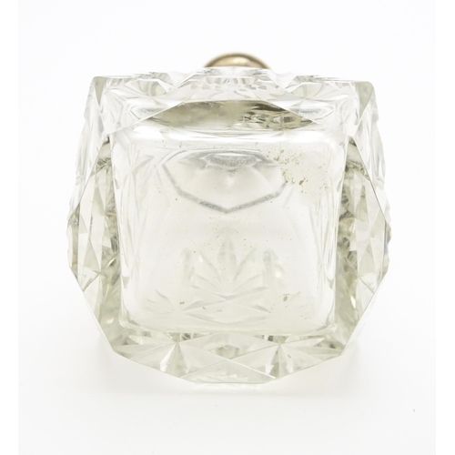 326 - A cut glass scent / perfume bottle / flask with German .800 silver mount. Approx. 8 1/2