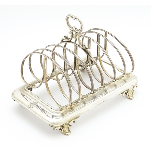 342 - A 19thC silver seven bar toast rack hallmarked London c. 1839. Approx. 7