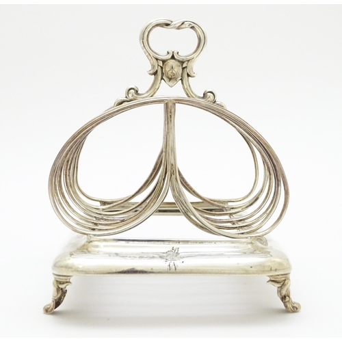 342 - A 19thC silver seven bar toast rack hallmarked London c. 1839. Approx. 7