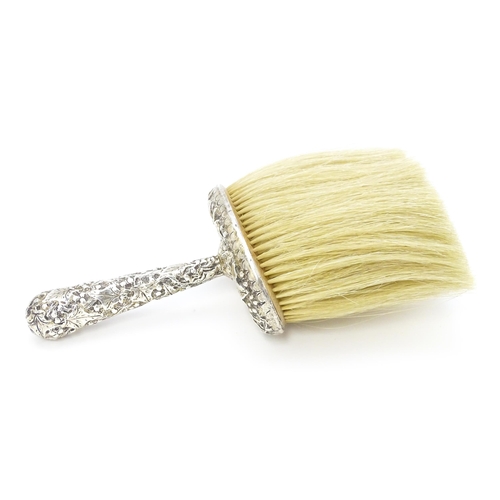 357 - A Victorian silver handled hat brush with foliate decoration, hallmarked London 1889, maker Charles ... 