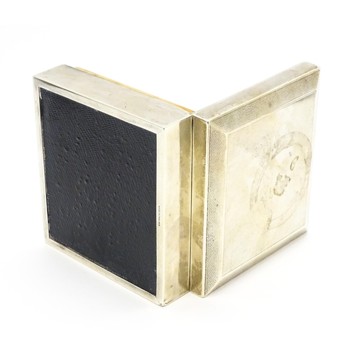 427 - A silver cigarette box with engine turned decoration hallmarked Birmingham 1951, maker Poston Produc... 