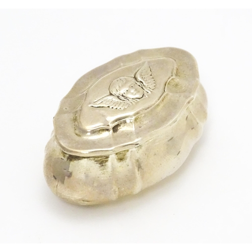 429 - A Victorian silver pill box the hinged lid with angel head decoration, hallmarked Birmingham 1899, m... 