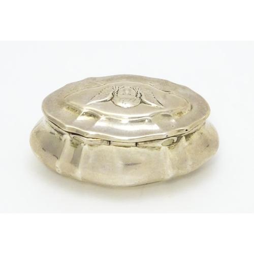 429 - A Victorian silver pill box the hinged lid with angel head decoration, hallmarked Birmingham 1899, m... 