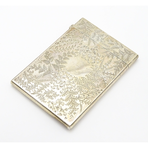 430 - A Victorian silver visiting card case with engraved foliate decoration hallmarked Birmingham 1890, m... 