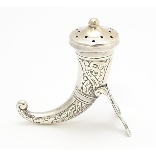 437 - Scandinavian Silver: A Norwegian silver pepper formed as a hunting horn with engraved decoration, ma... 