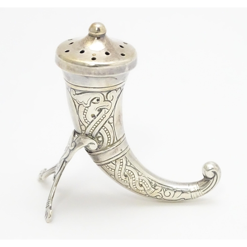 437 - Scandinavian Silver: A Norwegian silver pepper formed as a hunting horn with engraved decoration, ma... 