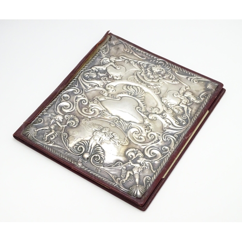 440 - A leather blotter with Britannia Standard silver front hallmarked London 1985, maker RBB. Approx. 11... 