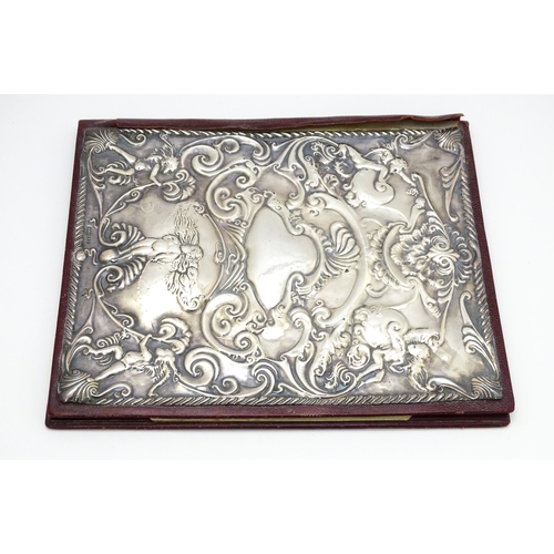 440 - A leather blotter with Britannia Standard silver front hallmarked London 1985, maker RBB. Approx. 11... 