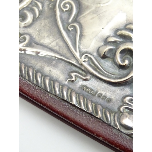 440 - A leather blotter with Britannia Standard silver front hallmarked London 1985, maker RBB. Approx. 11... 