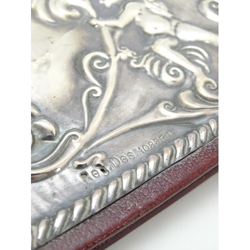 440 - A leather blotter with Britannia Standard silver front hallmarked London 1985, maker RBB. Approx. 11... 