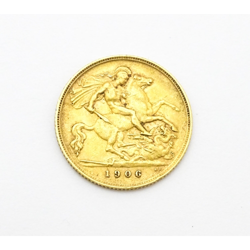 961 - Coin : A 1906 gold half sovereign coin. Total weight approx. 4g