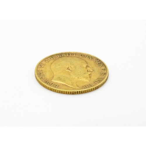 961 - Coin : A 1906 gold half sovereign coin. Total weight approx. 4g