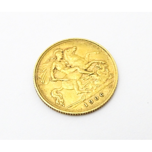 961 - Coin : A 1906 gold half sovereign coin. Total weight approx. 4g