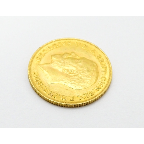 962 - Coin : A 1913 gold half sovereign coin. Total weight approx. 4g