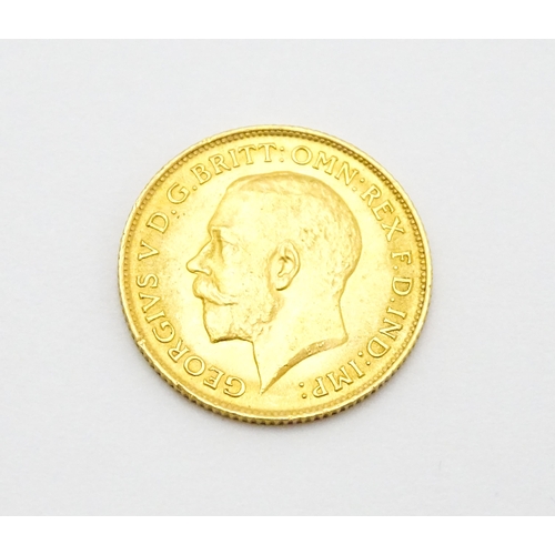 962 - Coin : A 1913 gold half sovereign coin. Total weight approx. 4g