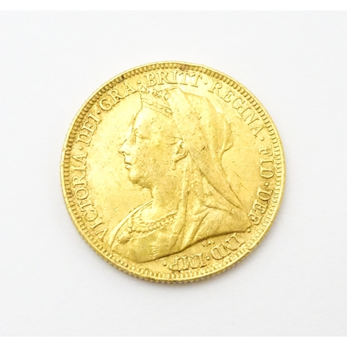 964 - Coin: A Victorian 1893 gold sovereign coin. Approx. 8g