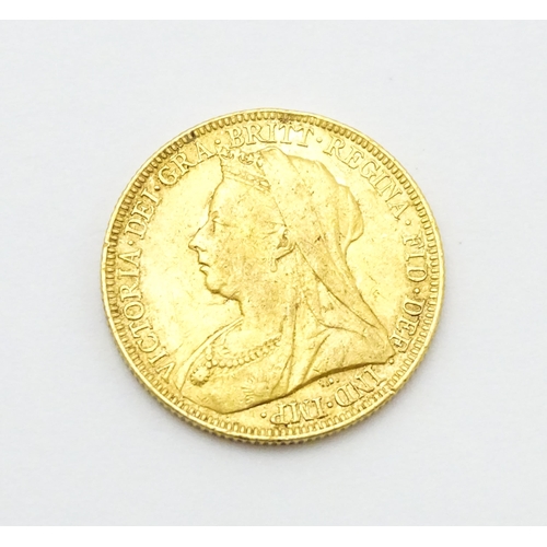 964 - Coin: A Victorian 1893 gold sovereign coin. Approx. 8g