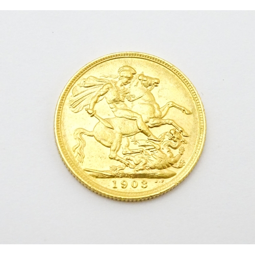 965 - Coin: An Edward VII 1903 gold sovereign coin. Approx. 8g