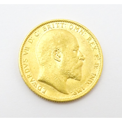 965 - Coin: An Edward VII 1903 gold sovereign coin. Approx. 8g